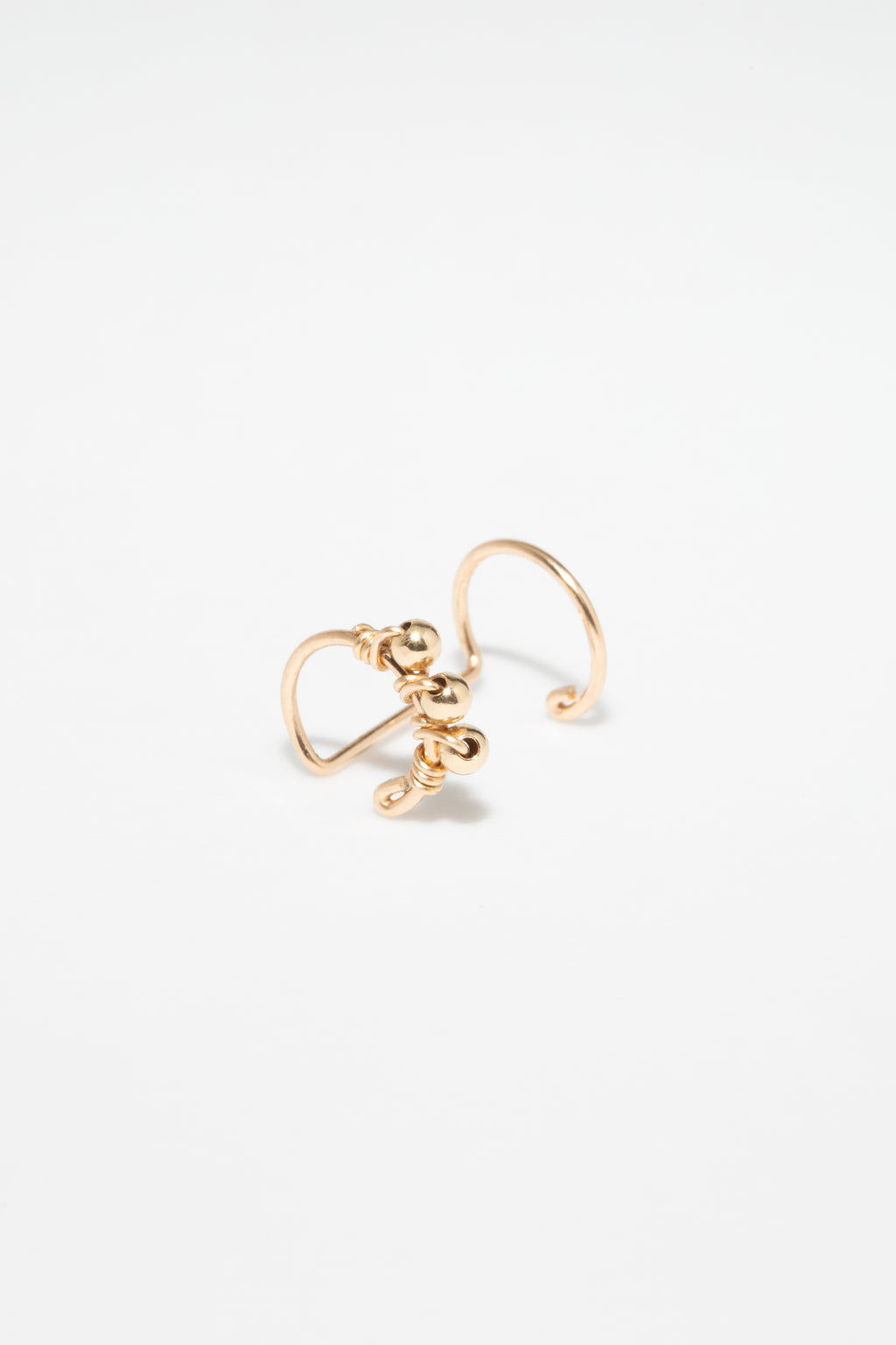 Woven double helix faux piercing
