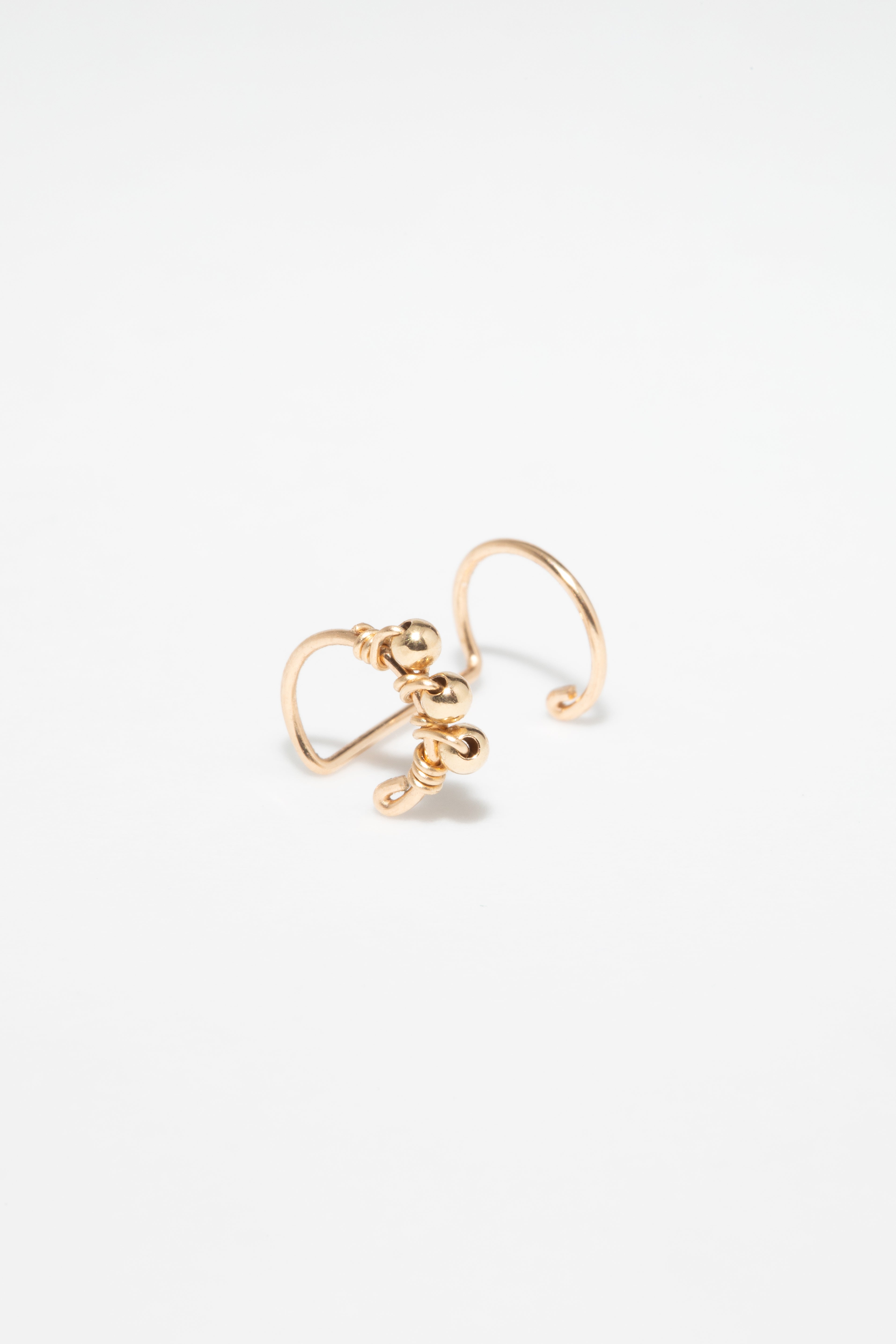 Woven double helix faux piercing