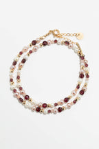 Collier Vénus Chichis porté, dégradé de pierres rouges et rosées