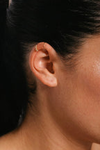 Woven double helix faux piercing