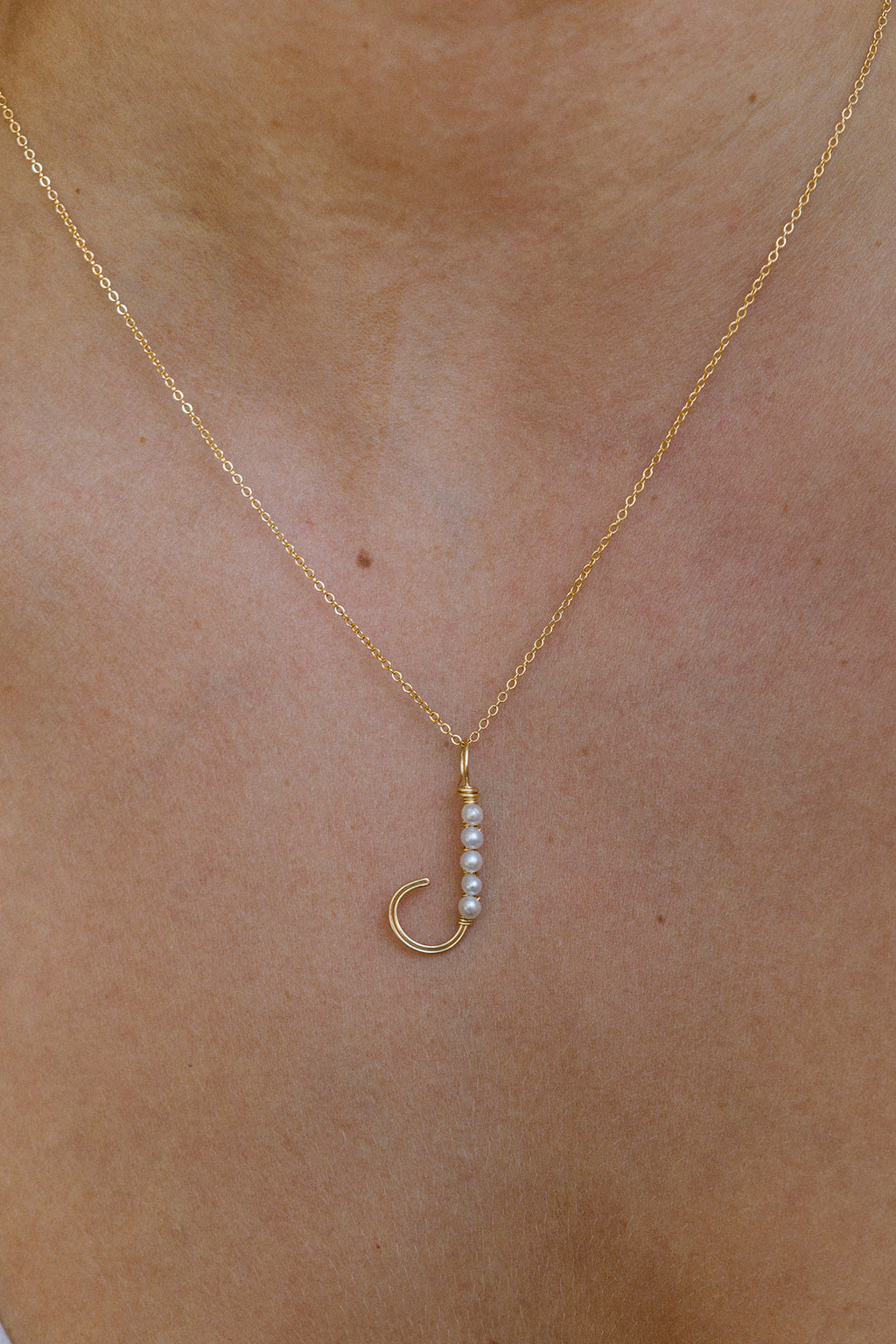 Woven letter - Cultured pearl