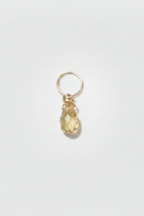 Pendentif Mia en or 18 carats, saphir jaune en goutte facettée suspendu à un anneau d'or