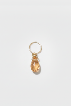 Pendentif Mia en or 18 carats, saphir orange en goutte facettée suspendu à un anneau d'or